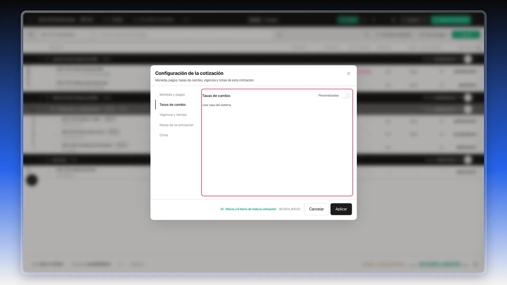 Sección Tasas de cambio resaltada, con el interruptor Personalizadas apagado y el texto Usar tasa del sistema